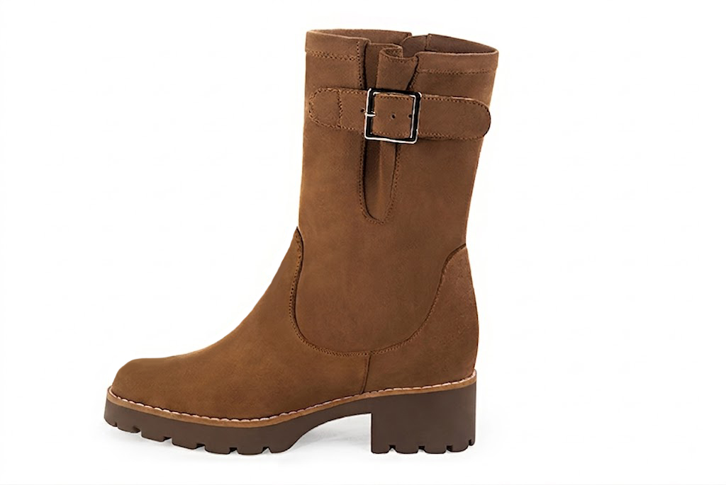 Handcrafted women's comfortable and elegant ankle boots, with buckles on the sides in premium caramel brown leather. Thick rubber soles. Round toe. Perfect for elevated everyday style. 
                Choose from our luxurious collections of leather and fabric to perfectly match your ankle boots to your outfits. - Florence KOOIJMAN
